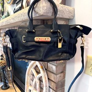 Almost new Coach purse, with small and large strap.